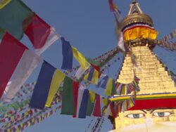 MS ZO View of colorful prayer flags on Boudhanath Stupa / Kathmandu, Central, Nepal Stock Footage