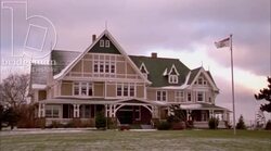 Static shot of a country inn in the winter by day Stock Footage