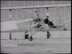 1939: SIKORSKY HELICOPTER: VS Aeronautical engineer Igor Sikorsky in pilot seat testing VS-300 design, lifting upward, hovering, rocking side-to-side.  Note: Poor focus.  [VO Sikorsky, imense satisfaction, didn't know how to build, or fly it] Instructional Video