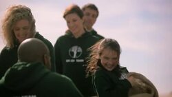 Volunteers moving through check in line Stock Footage