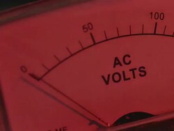 ECU Shot of voltmeter spiking with alternating white and red light / United States Stock Footage