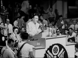 1948: DEMOCRATIC NATIONAL CONVENTION: Unidentified male behind podium reading Democratic Committee recommendations: The Democratic party adopts this platform...four freedoms...leadership...democracy superior form of government... Instructional Video