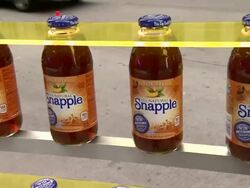ATMOSPHERE - Participants and signage at Snapple Brings Real Fact To Real Life For Lady Liberty With Help From Nick Cannon Stock Footage