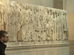 Tourists viewing the Parthenon marbles at the British Museum News Clip