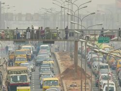 WS View of motorway and dense traffic with people walking on public bridge / Lagos, Nigeria Stock Footage