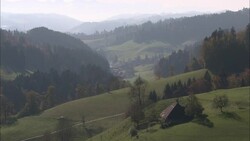 Lush, wooded hills surround a cabin in Bern, Switzerland. Stock Footage