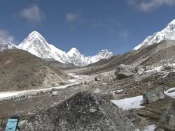 WS ZO View of Route to Everest Basecamp and man walking in Khumbu(Glacier) Valley / Thokla, Khumbu Region, Nepal Stock Footage