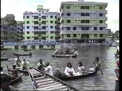 AS INCOMING - Number of dead continues to rise in floods News Clip