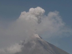 Mayon volcano erupts ash and steam from summit, Philippines, December 2009 Stock Footage