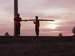 MS Montage of honour guard in full military dress lowering national Sri Lanka flag at dusk on 'Galle Face Green' / Colombo, Western Province, Sri Lanka Stock Footage