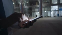 Man using mobile phone at night in the city Stock Footage