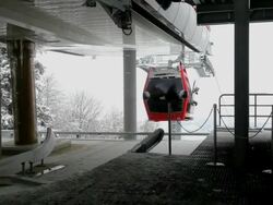 Red cabin moving into station Stock Footage