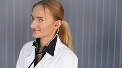 Female doctor with stethoscope in ears Stock Footage
