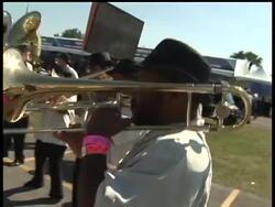 An early look at fans arriving for the Super Bowl in Miami. News Clip