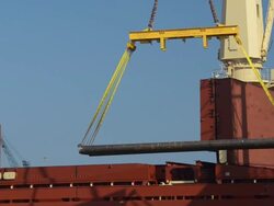 Lifting Steel Pipes onto ship Stock Footage