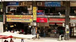 A data recovery and computer hardware repair centre at the Nehru Place market, India Stock Footage