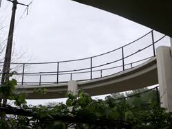 MS  young man running for exercise  on  ramp near train tracks  / Minneapolis, Minnesota, United States Stock Footage