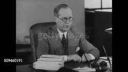 1937: MARITIME COMMISSION: VS Businessman Joseph Kennedy & team of four men going over books, researching in library, 'Joe' Kennedy sitting at desk. (Commission replaces US Shipping board) The Great Depression. Instructional Video