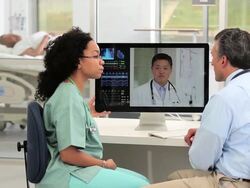 MS PAN Medical Workers Video Conferencing in Hospital Intake / Richmond, Virginia, United States Stock Footage