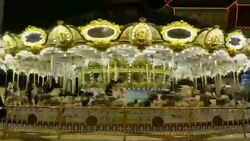 Carousel at amusement park Stock Footage