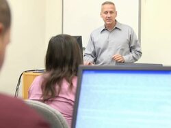 Caucasian Male Teaching Adult Students - MS b Stock Footage