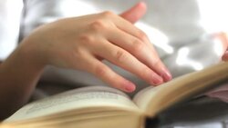 Teenager list the book Stock Footage