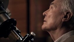 Old man with telescope Stock Footage