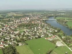 WS AERIAL View approach to town besids crossing bridge over river Auxonne / Cote d'Or, Monaco Stock Footage