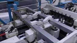 Machine stitching and cutting printed paper in the printing plant Stock Footage