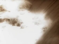 Sepia tone aerials showing raging water with debris, erosion and flooded rice fields in Cambodia Stock Footage