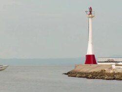 WS View of speed boat moving in ocean near lighthouse / abergris caye, belize, belize Stock Footage