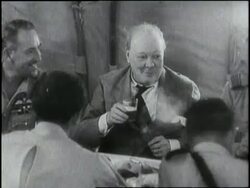British Prime Minister, Winston Churchill drinks alcohol with British troops while visiting Africa. News Clip