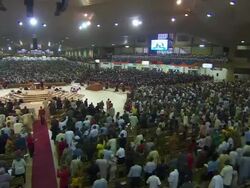 WS View of Large church interior with people siting on benches and praying / Lagos, Nigeria Stock Footage