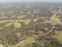 WS AERIAL View of highway and town / North Carolina, United States Stock Footage