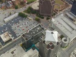 WS AERIAL View of buildings, street and parking lot / North Carolina, United States Stock Footage