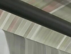 CU Shot of news paper being print in web press at newspaper printing office / Russelheim, Hesse, Germany Stock Footage