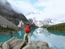 WS Shot of Male hiker Moraine Lake Valley Alberta / Canada Stock Footage