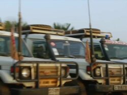MS PAN ZI Shot of doctors without borders 4x4 vehicles parked in row / Juba, Central Equatoria, Sudan  Stock Footage