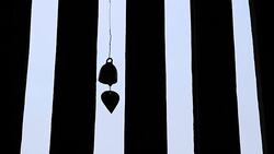 Moving of bell at Buddhist Temple Window Stock Footage