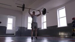 Professional Female Powerlifter Doing Overhead Press Stock Footage