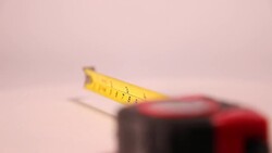 Tape measure showing 6 inches or 15 cm Stock Footage