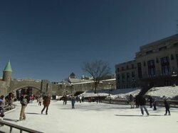 WS View of Ice skaters at Place You Ville / Quebec, Canada Stock Footage