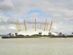 T/L Millennium Dome with stormy clouds, London, England Stock Footage