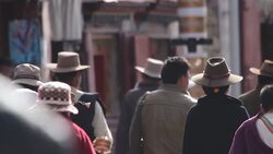 Crowded people praying and walking at Tibet Stock Footage