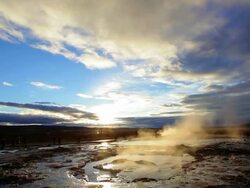 WS View of erupting Geyser Strokkur at sunset / Iceland Stock Footage