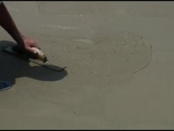Construction: Smoothing Wet Cement / Concrete Stock Footage