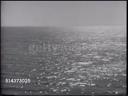 1965: BODY OF WATER: TD WS Ocean, sea w/ wind ripples on calm water, TU WS Empty ocean, sea w/ no waves, or boats, intense early afternoon light reflection. Instructional Video
