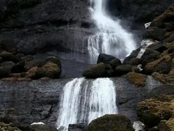 MS View of Water fall flowing in to bottom / Iceland  Stock Footage