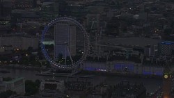 Aerials of London landmarks lit up in Tricolour colours News Clip