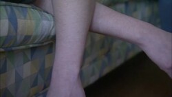 A young woman sleeps on a couch. Stock Footage